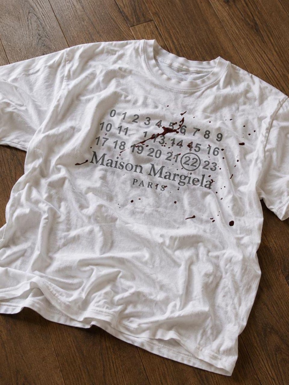 Maison Martin Margiela White Logo Tee with Brown Paint Splatter